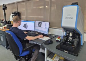 Person working at PC workstation